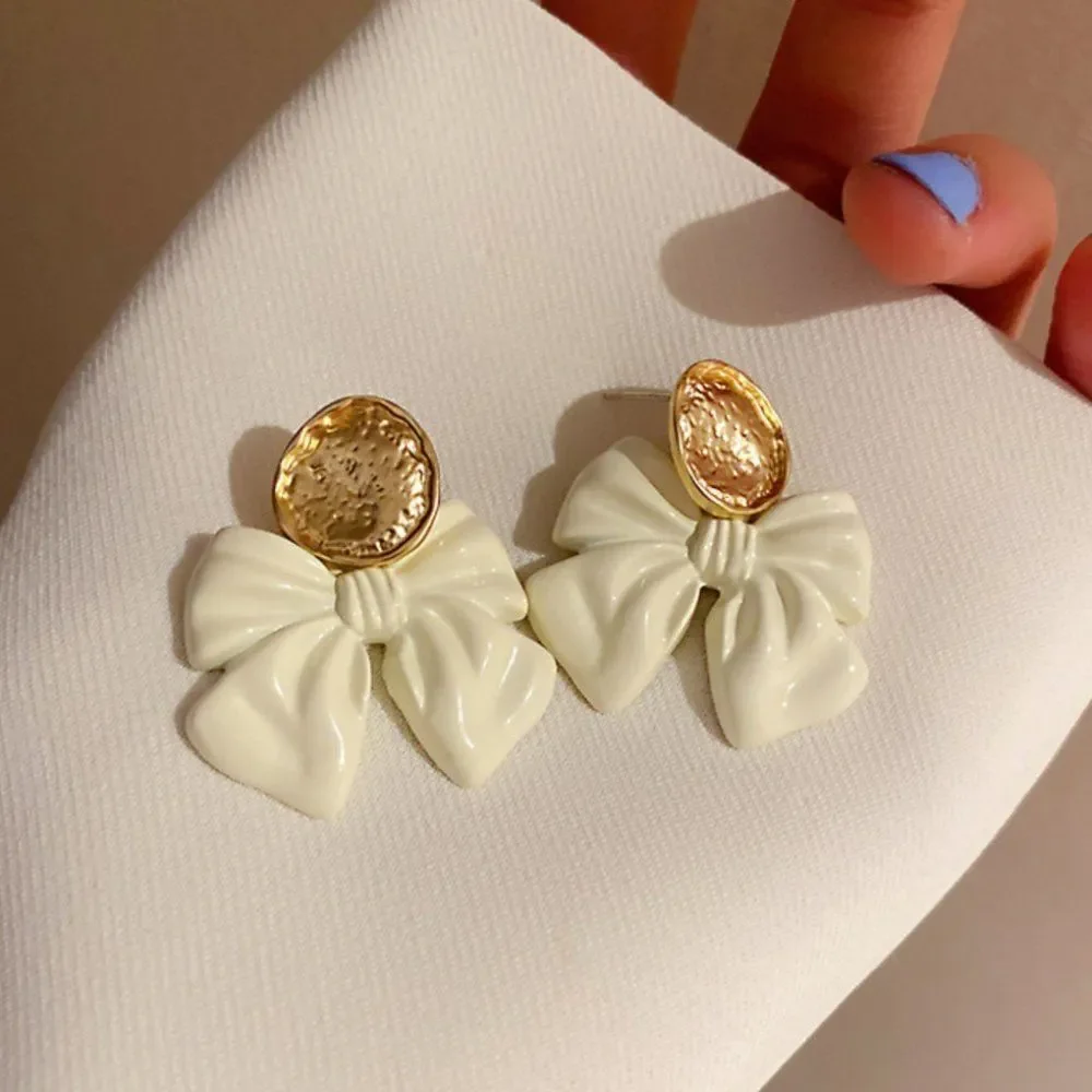 White gold bow earrings